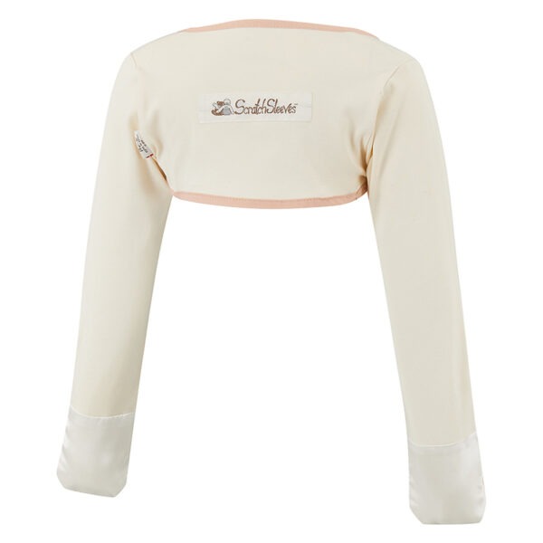 Back view of children's bolero style original cream ScratchSleeves. Cream body and long sleeves with cappuccino colour trim and white sewn in eczema mitts. 100% cotton body and 100% natural silk mitts. External branding in the middle of the back.