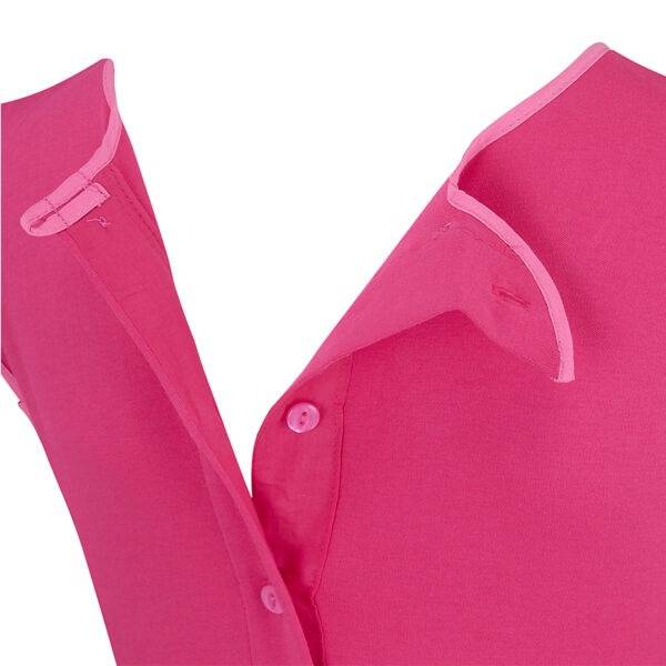 Close up view of the back of ScratchSleeves children and teens happy pink superhero dungarees, shows the reinforced opening at the back, from the neck down, partially open with pink buttons on the right and holes and a loop for the buttons on the left. Additional tab on the right with button hole which folds over the neckline with button fastening to keep it secure . Dark pink sleeveless body in 100% cotton jersey with light pink woven cotton trim on the neck.