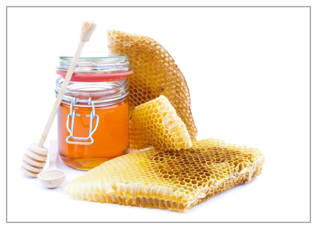 Glass honey pot with honeycombs
