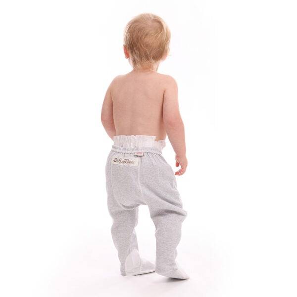 Back view of little boy standing wearing ScratchSleeves toddlers grey marl pyjama bottoms with sewn in feet. Shows that the pyjama bottoms fit comfortably over a disposable nappy. The pyjama bottoms have external leg, waist and bottom seams. Closed feet with a layer of white, 100% woven cotton over the front of the foot, under the toe and inside the ankle.